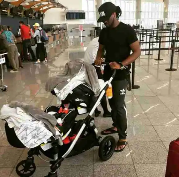 "Papa At Work ": Paul Okoye Shuttles His Twins In Trolley (Photo)